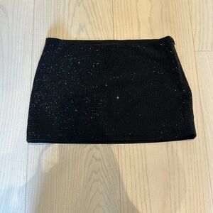 Super sparkly Zara mini skirt with zip on the side.